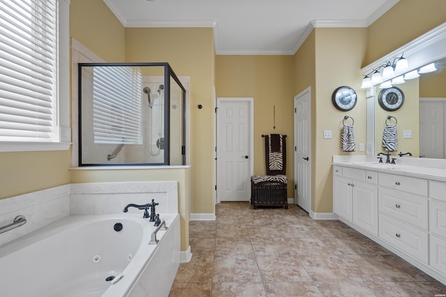 bathroom with ornamental molding, a tub with jets, a shower stall, and vanity