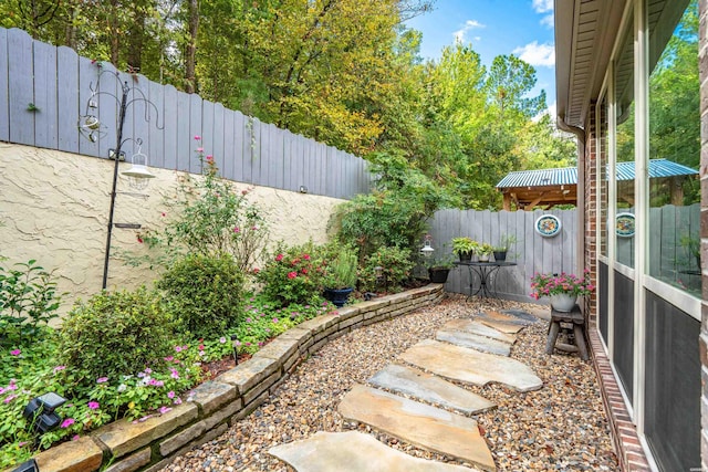 view of yard with a fenced backyard