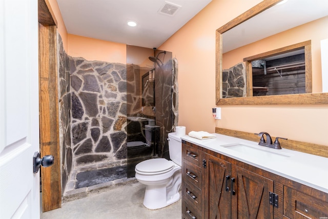 120 Needham Rd, Fountain Lake, AR 71901 - full bathroom featuring vanity, toilet, a walk in shower, visible vents, and finished concrete floors