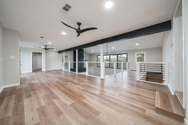 empty room featuring a ceiling fan, recessed lighting, visible vents, and light wood-style flooring