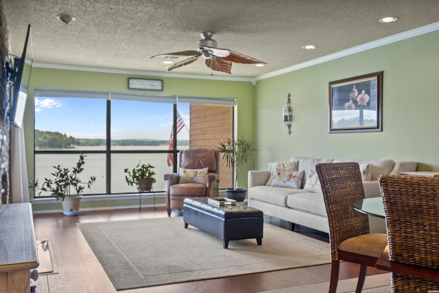 310 Kleinshore Rd Unit C9, Hot Springs, AR 71913 - living room with crown molding, ceiling fan, a textured ceiling, wood finished floors, and recessed lighting