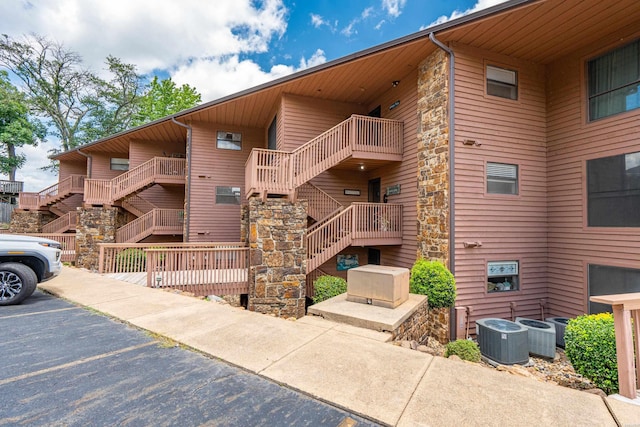 310 Kleinshore Rd Unit C9, Hot Springs, AR 71913 - view of property featuring stairway and uncovered parking