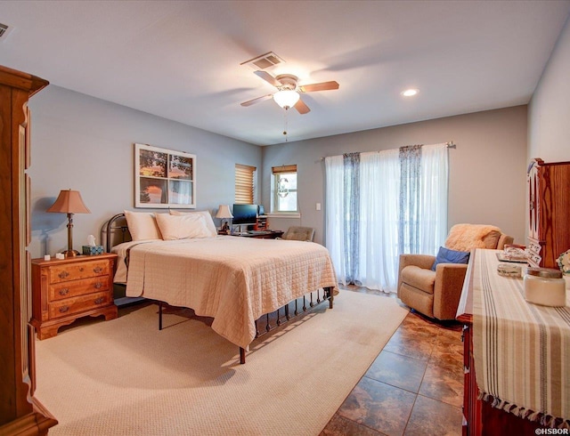 bedroom with ceiling fan, recessed lighting, and visible vents