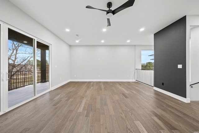 106 Imperial Ct, Hot Springs, AR 71913 - spare room with wood finished floors, a ceiling fan, recessed lighting, and baseboards