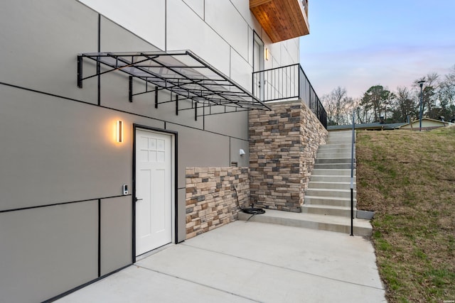 106 Imperial Ct, Hot Springs, AR 71913 - view of side of home featuring stairway, stucco siding, and stone siding