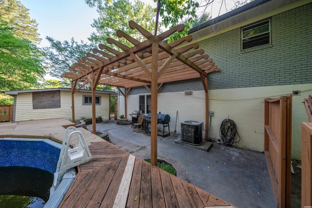 deck with a pergola, grilling area, a patio, and central air condition unit