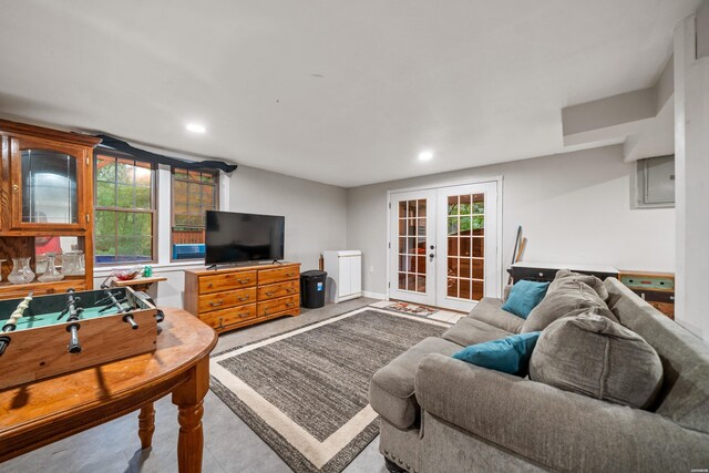 living room featuring french doors and recessed lighting