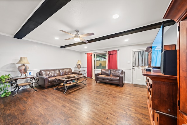 living area with ceiling fan, beam ceiling, wood finished floors, recessed lighting, and crown molding