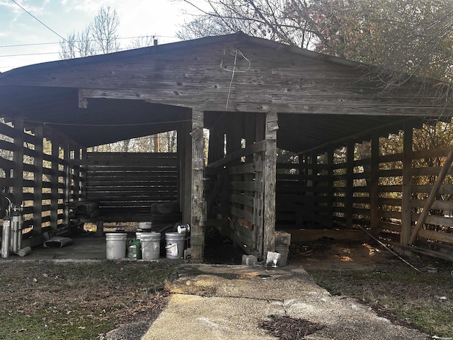 view of patio with an outbuilding