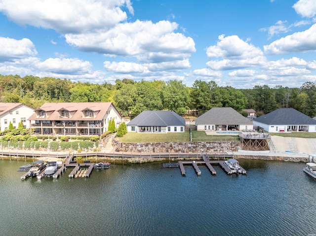 bird's eye view featuring a residential view and a water view