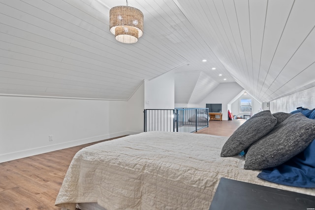 bedroom with lofted ceiling, recessed lighting, wood ceiling, wood finished floors, and baseboards