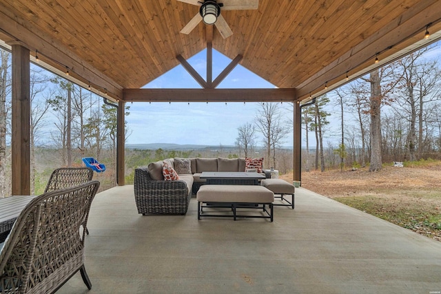 view of patio / terrace featuring ceiling fan and an outdoor living space