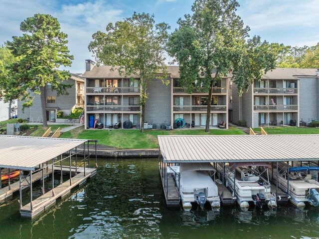 250 Grand Isle Dr Unit 5-A, Hot Springs, AR 71913 - view of dock featuring a water view, boat lift, and a yard