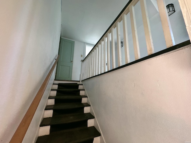 staircase with baseboards