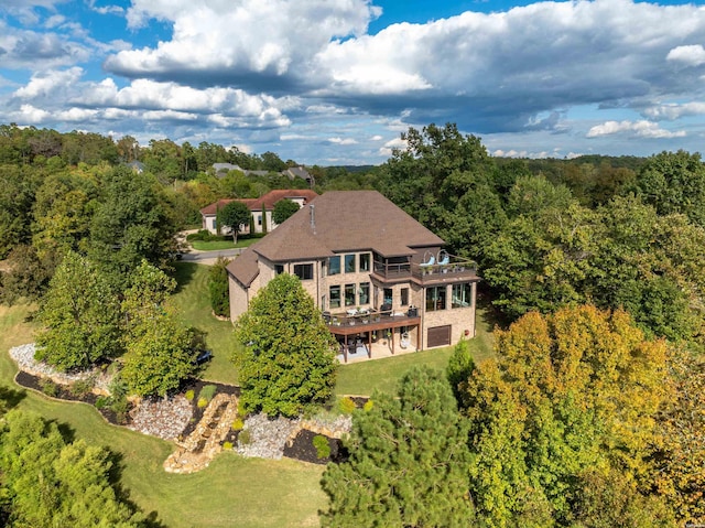 drone / aerial view with a forest view