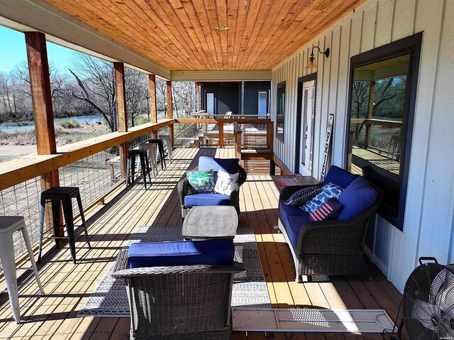 sunroom / solarium with wooden ceiling