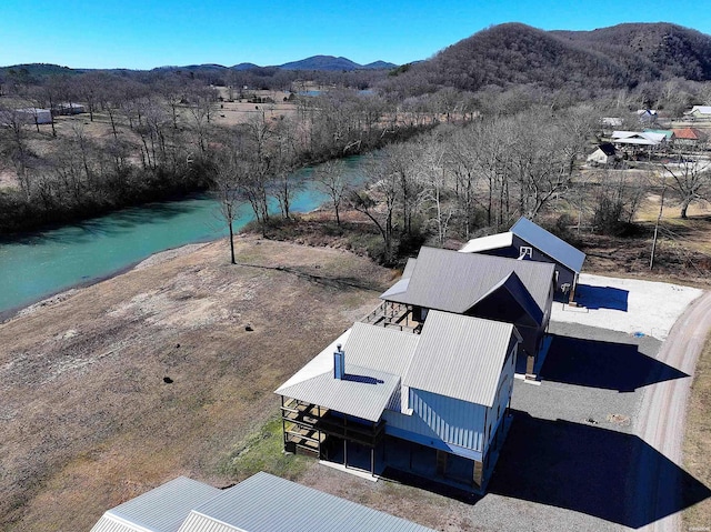 birds eye view of property featuring a mountain view