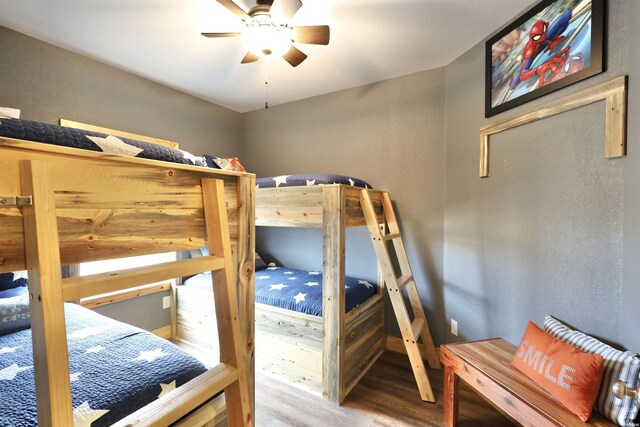 bedroom featuring wood finished floors