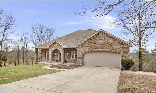 view of front of home featuring brick siding, a shingled roof, concrete driveway, a front yard, and a garage