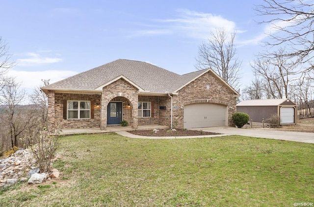 view of front of house featuring driveway, roof with shingles, a front yard, an attached garage, and brick siding