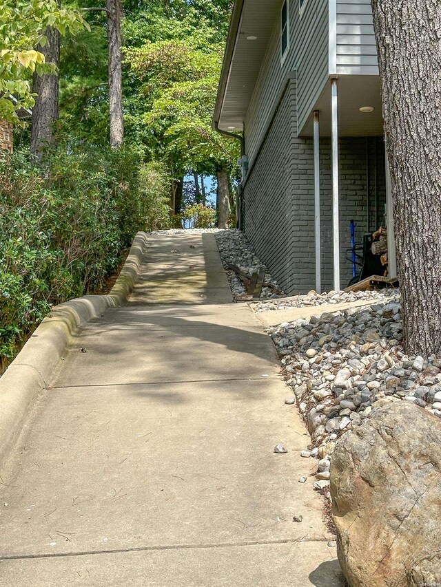 view of home's exterior featuring brick siding