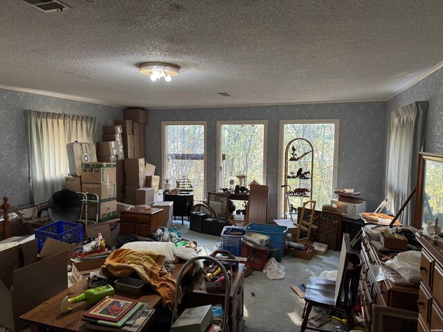 miscellaneous room featuring a textured ceiling, carpet floors, visible vents, and wallpapered walls