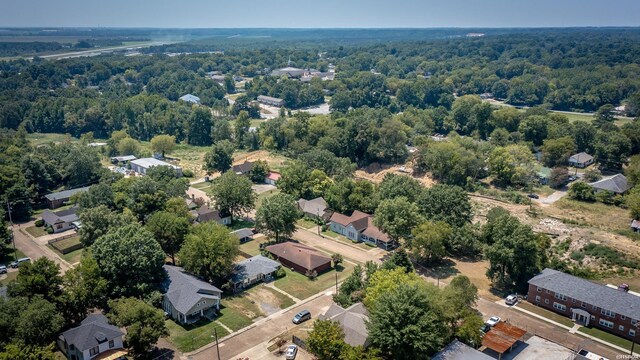 801 Crittenden St, Arkadelphia, AR 71923 - aerial view of residential area featuring a forest