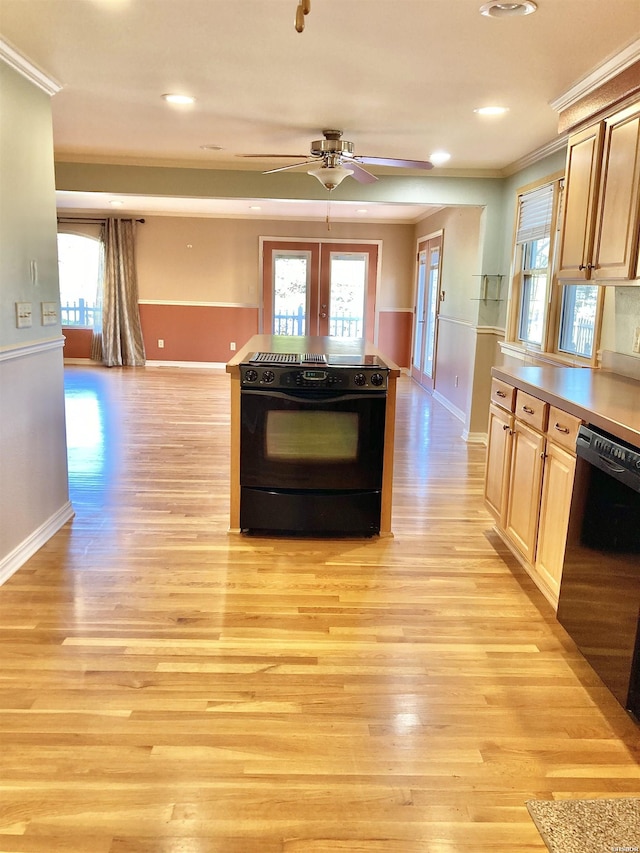 117 Waverly St, Hot Springs, AR 71913 - kitchen with ornamental molding, black appliances, light wood finished floors, and a ceiling fan