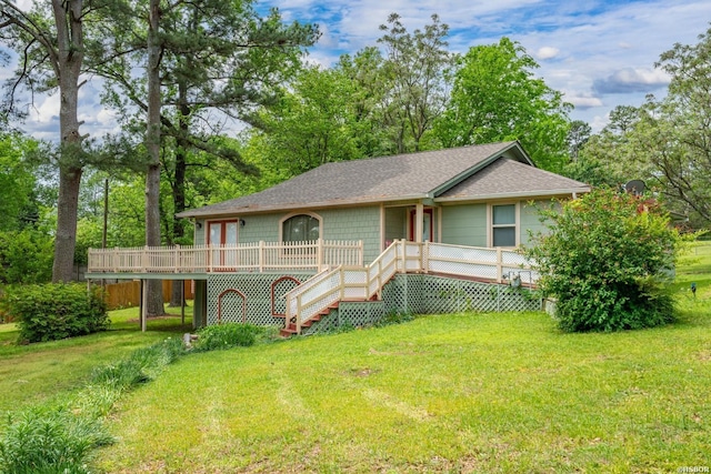117 Waverly St, Hot Springs, AR 71913 - ranch-style house with a wooden deck, stairway, a shingled roof, and a front lawn