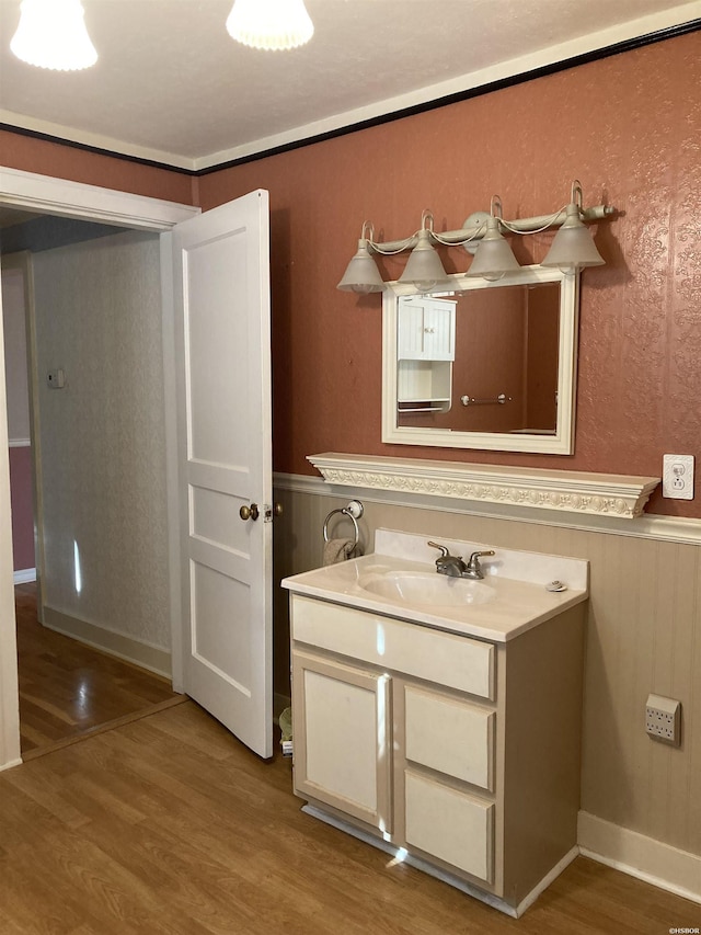 117 Waverly St, Hot Springs, AR 71913 - bathroom featuring vanity, a wainscoted wall, and wood finished floors