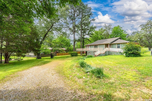 117 Waverly St, Hot Springs, AR 71913 - exterior space featuring stairway, fence, a wooden deck, and driveway