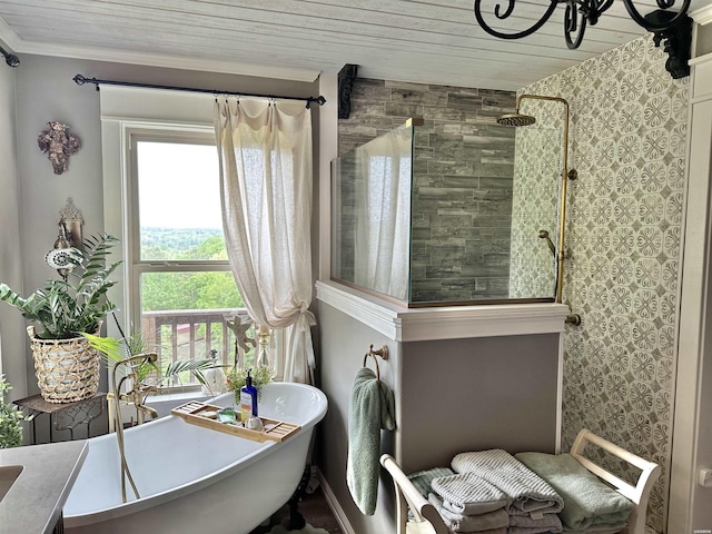 full bathroom featuring a tile shower, wooden ceiling, a freestanding bath, and ornamental molding