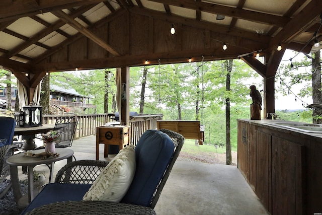view of patio / terrace with a sink and a wooden deck