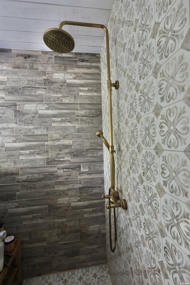 full bathroom with a tile shower