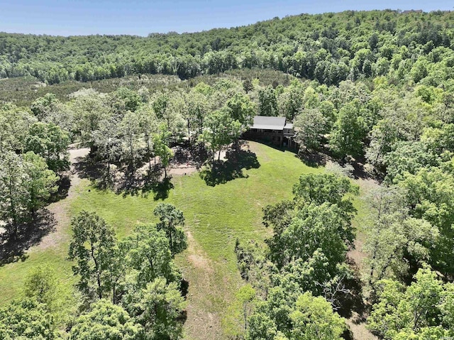 drone / aerial view with a forest view