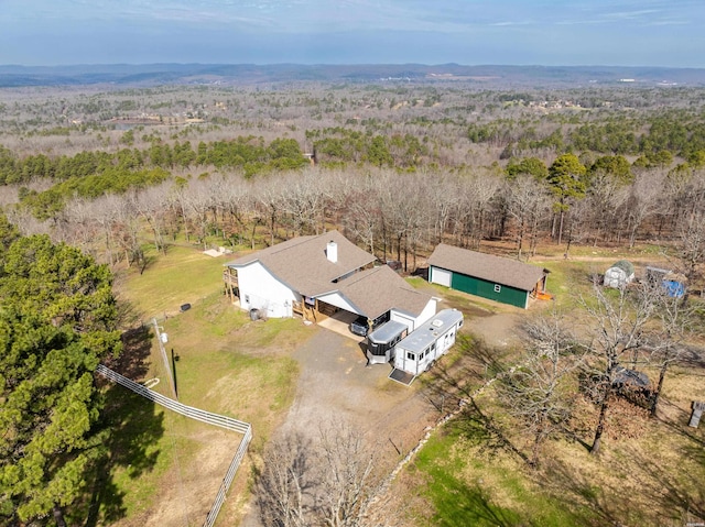 drone / aerial view with a forest view