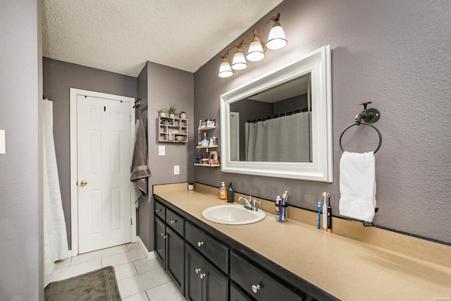 2939 Finch Rd, Bismarck, AR 71929 - bathroom with vanity, tile patterned floors, and a textured ceiling