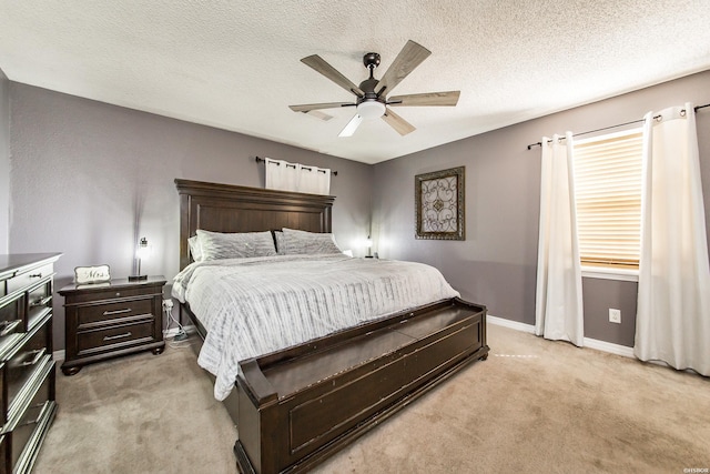 2939 Finch Rd, Bismarck, AR 71929 - bedroom featuring light carpet, baseboards, a textured ceiling, and a ceiling fan