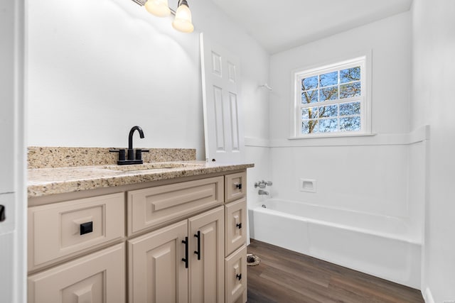 bathroom with vanity and wood finished floors