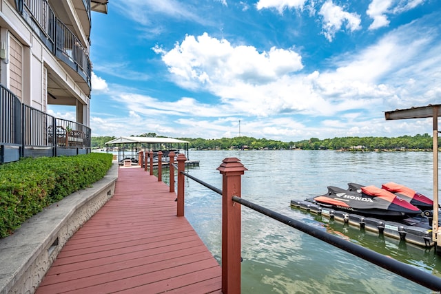 dock area featuring a water view