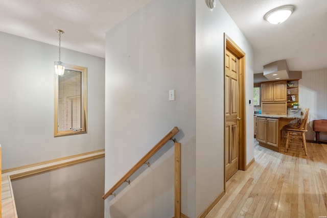 111 Black Oak Ct, Hot Springs, AR 71913 - hall featuring a desk, an upstairs landing, and light wood finished floors