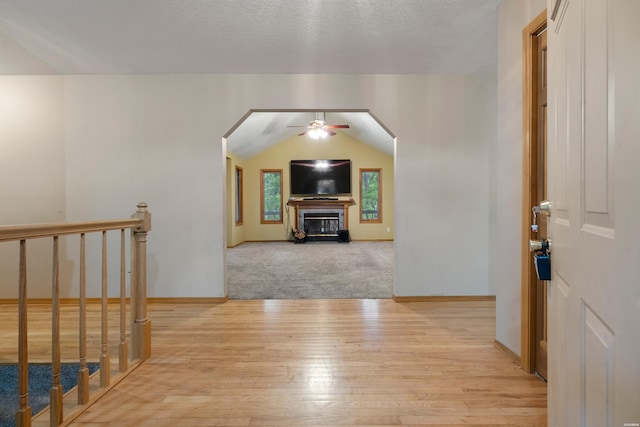111 Black Oak Ct, Hot Springs, AR 71913 - entrance foyer featuring ceiling fan, light wood-style floors, and arched walkways
