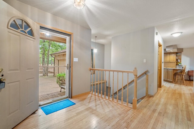 111 Black Oak Ct, Hot Springs, AR 71913 - foyer entrance with light wood finished floors and baseboards
