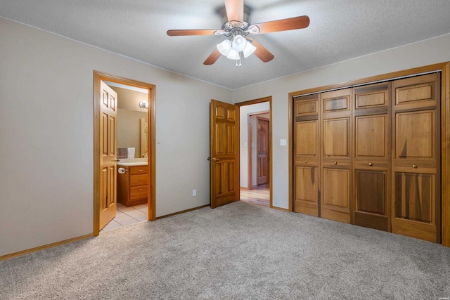 111 Black Oak Ct, Hot Springs, AR 71913 - unfurnished bedroom with light carpet, a closet, connected bathroom, and ceiling fan