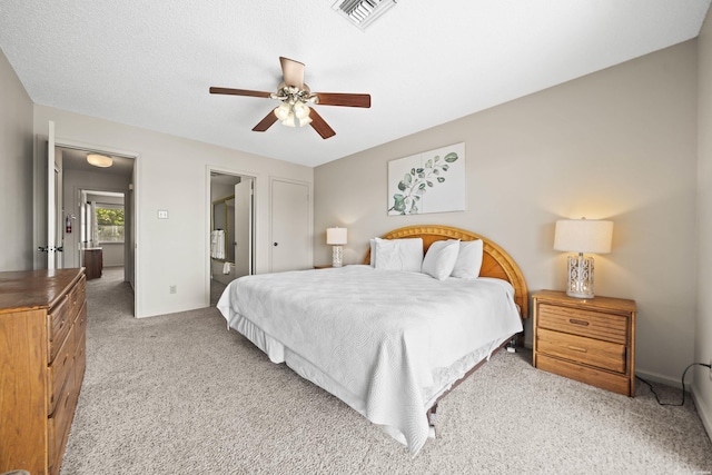 5371 Central Ave Unit 6G, Hot Springs, AR 71913 - bedroom featuring light carpet, a ceiling fan, and connected bathroom