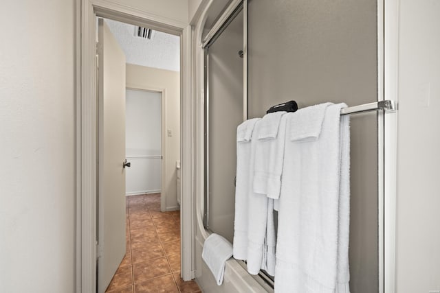 5371 Central Ave Unit 6G, Hot Springs, AR 71913 - full bath with tile patterned flooring and a textured ceiling
