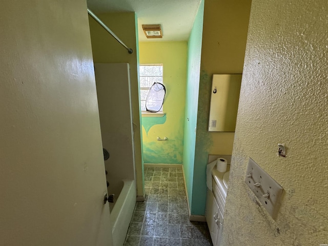 bathroom with baseboards