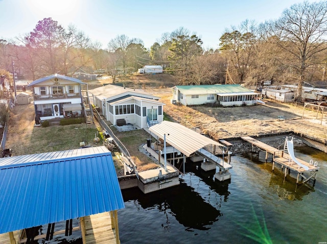 view of dock featuring a water view and boat lift