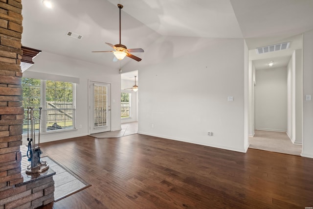 unfurnished living room featuring high vaulted ceiling, visible vents, dark wood finished floors, and ceiling fan