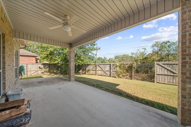 view of patio / terrace with a fenced backyard and ceiling fan